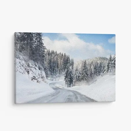 Cuadro en lienzo carretera nevada entre bosques de pinos – Pixers®