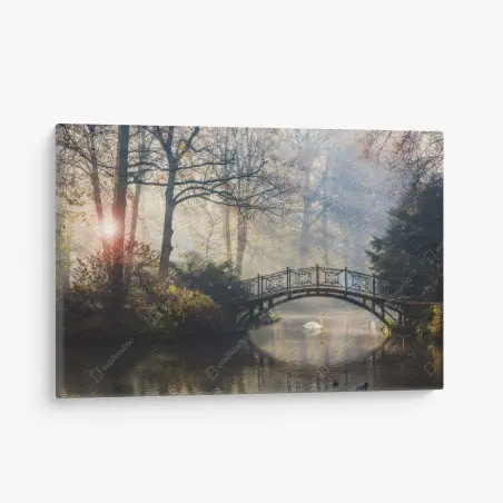 Cuadro en lienzo amanecer de otoño con puente y cisne – Pixers®