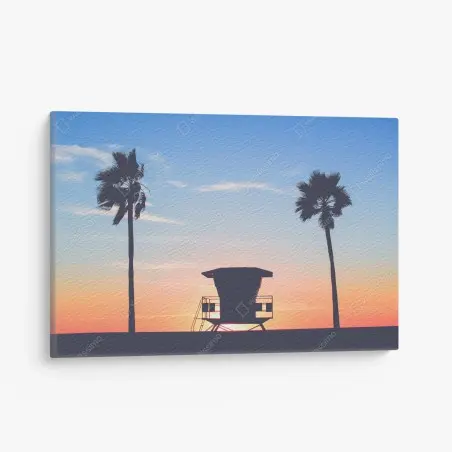 Cuadro en lienzo puesta de sol en la playa con torre de salvavidas – Pixers®