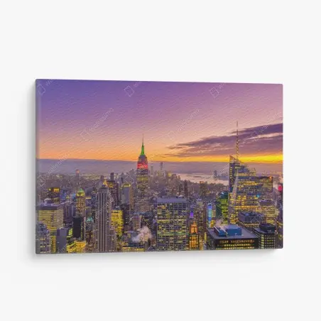 Cuadro en lienzo skyline iluminado de Nueva York al atardecer – Pixers®