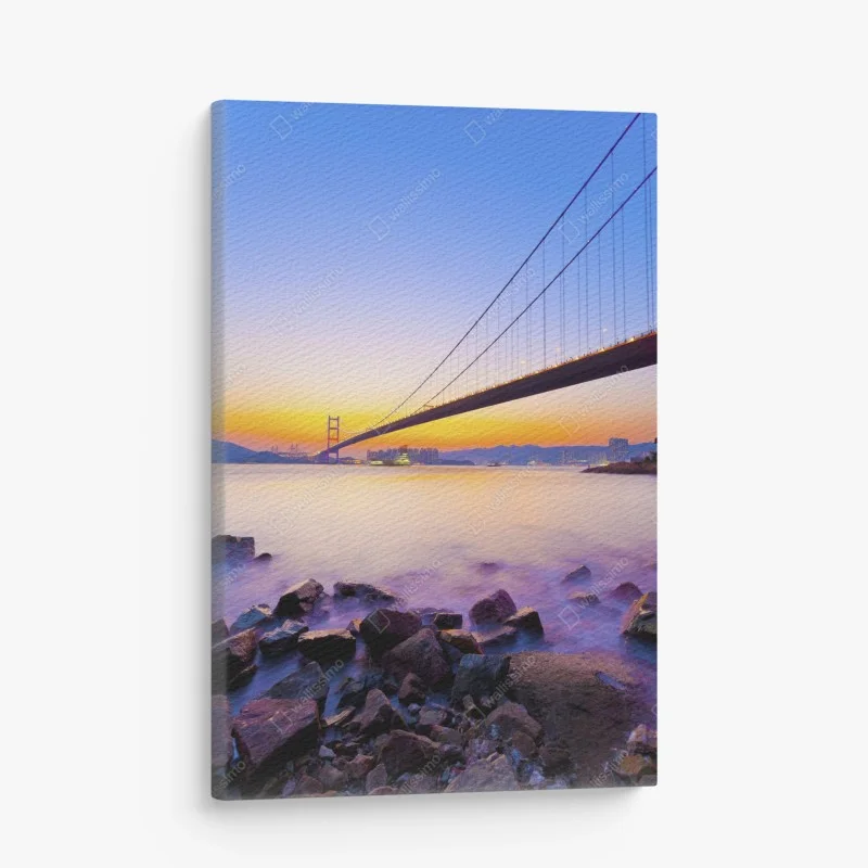 Cuadro en lienzo puente colgante al atardecer sobre la costa
