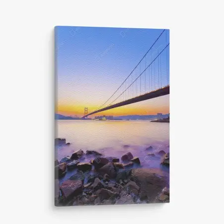 Cuadro en lienzo puente colgante al atardecer sobre la costa – Pixers®