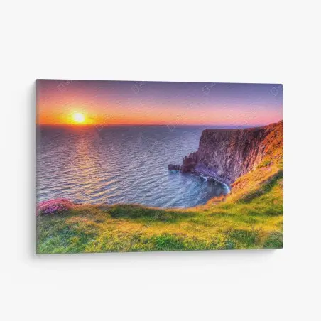 Cuadro en lienzo acantilado al atardecer sobre el mar – Pixers®