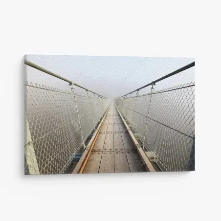 Cuadro en lienzo puente colgante entre la niebla – Pixers®