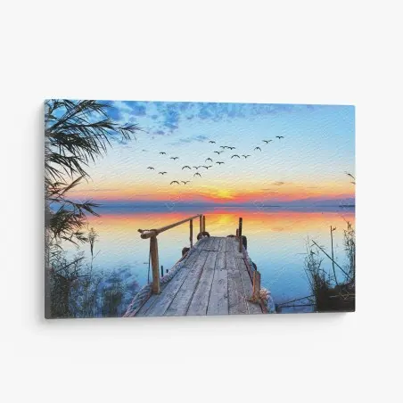 Cuadro en lienzo muelle al amanecer sobre aguas tranquilas – Pixers®