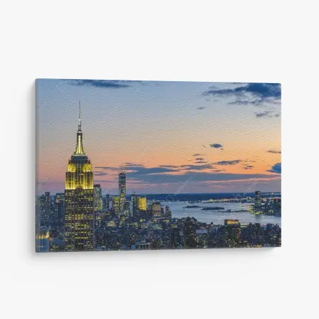 Cuadro en lienzo puesta de sol en Nueva York con Empire State Building iluminado – Pixers®