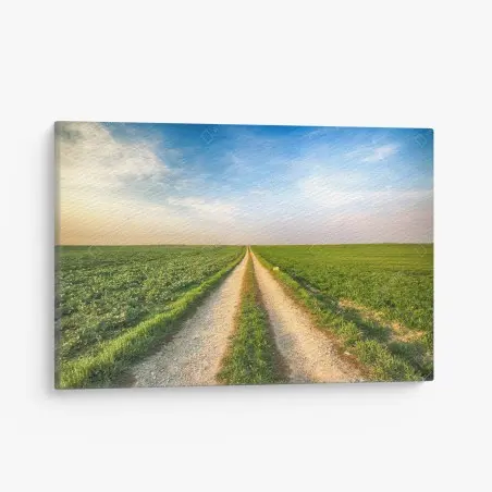 Cuadro en lienzo camino rural hacia el horizonte entre campos verdes – Pixers®
