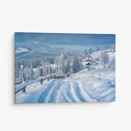 Cuadro en lienzo sendero hacia el pueblo alpino nevado – Pixers®