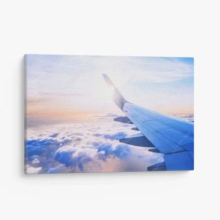 Cuadro en lienzo vista aérea desde el ala del avión sobre nubes al amanecer – Pixers®
