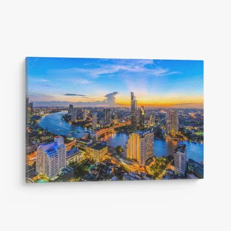 Cuadro en lienzo atardecer urbano sobre el río iluminado – Pixers®