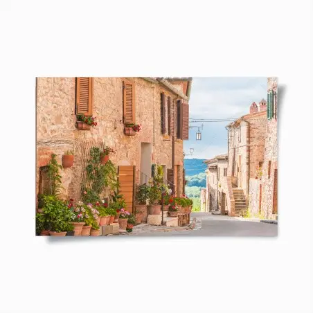 Póster calle medieval en Toscana con macetas y flores – Pixers®