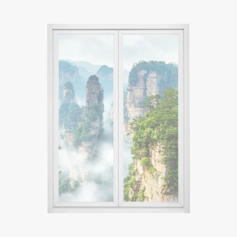 Pegatina para ventana paisaje de picos montañosos en la niebla