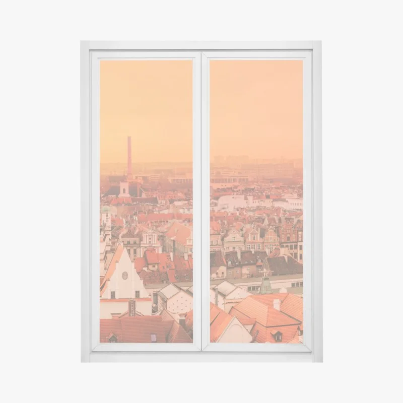 Pegatina para ventana paisaje urbano de tejados naranjas al atardecer