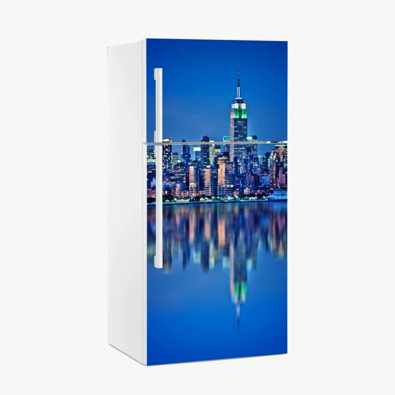 Pegatina para frigorífico panorámica nocturna de Nueva York con reflejos sobre el agua