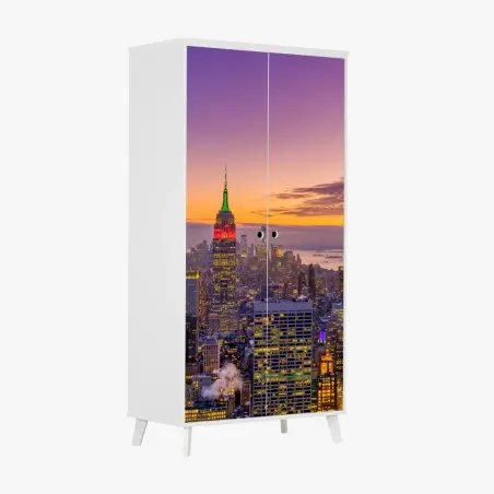 Pegatina para armario skyline iluminado de Nueva York al atardecer – Pixers®