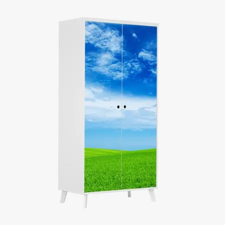 Pegatina para armario pradera verde bajo cielo azul brillante – Pixers®