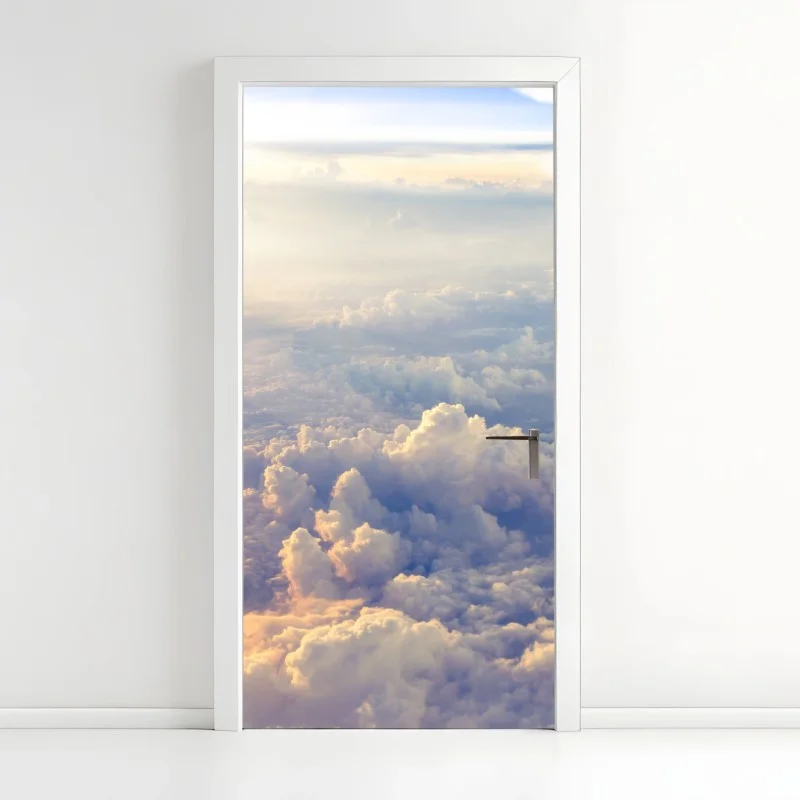 Pegatina para puerta amanecer entre nubes vista aérea serena