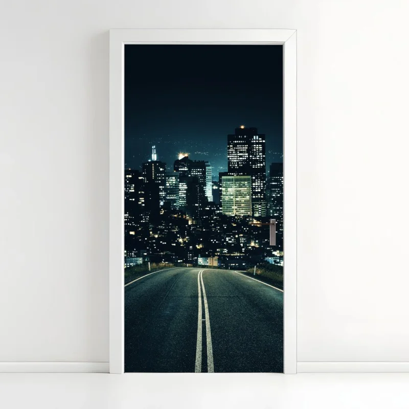 Pegatina para puerta camino nocturno hacia la ciudad iluminada