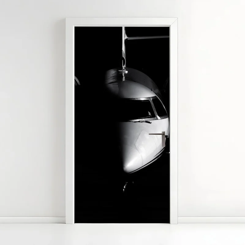 Pegatina para puerta perfil frontal minimalista de avión en blanco y negro