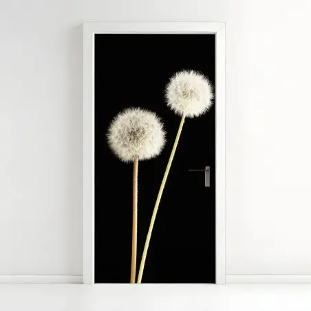 Pegatina para puerta elegancia efímera de dientes de león sobre fondo negro – Pixers®