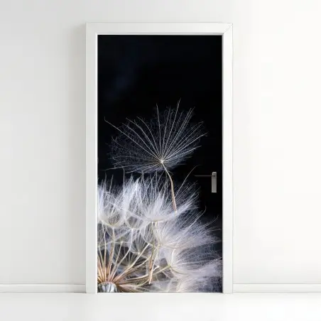 Pegatina para puerta semilla de diente de león sobre fondo negro – Pixers®