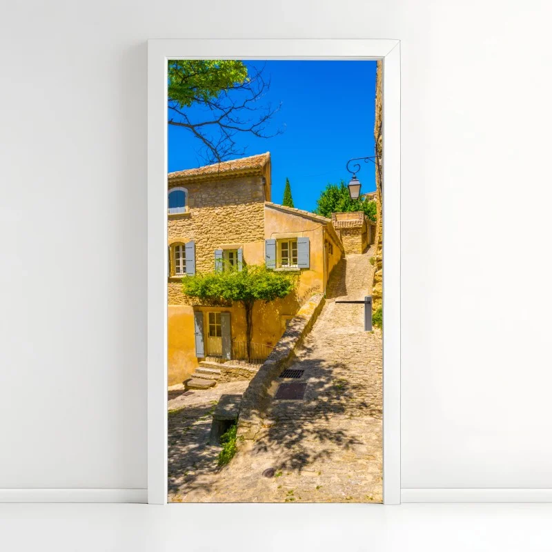 Pegatina para puerta escena soleada de pueblo de piedra