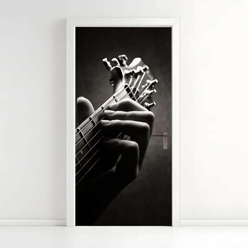 Pegatina para puerta melodía en las cuerdas: detalle de mano guitarrista