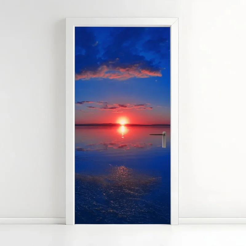 Pegatina para puerta puesta de sol sobre lago sereno