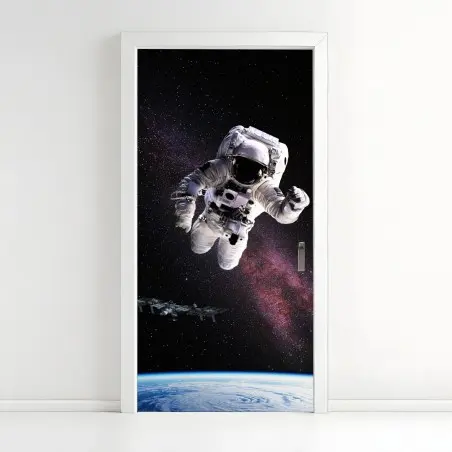Pegatina para puerta astronauta flotando sobre la Tierra – Pixers®