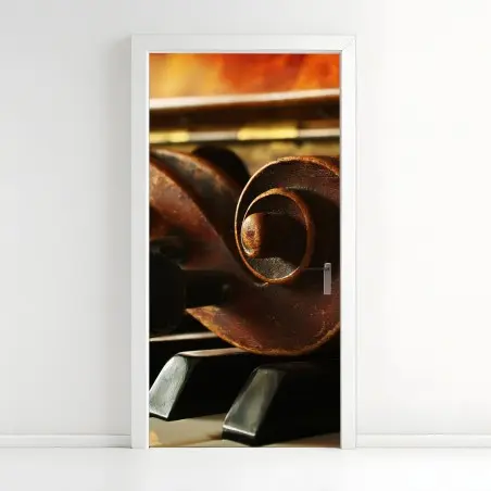Pegatina para puerta contrastes musicales: detalle de violín sobre piano – Pixers®
