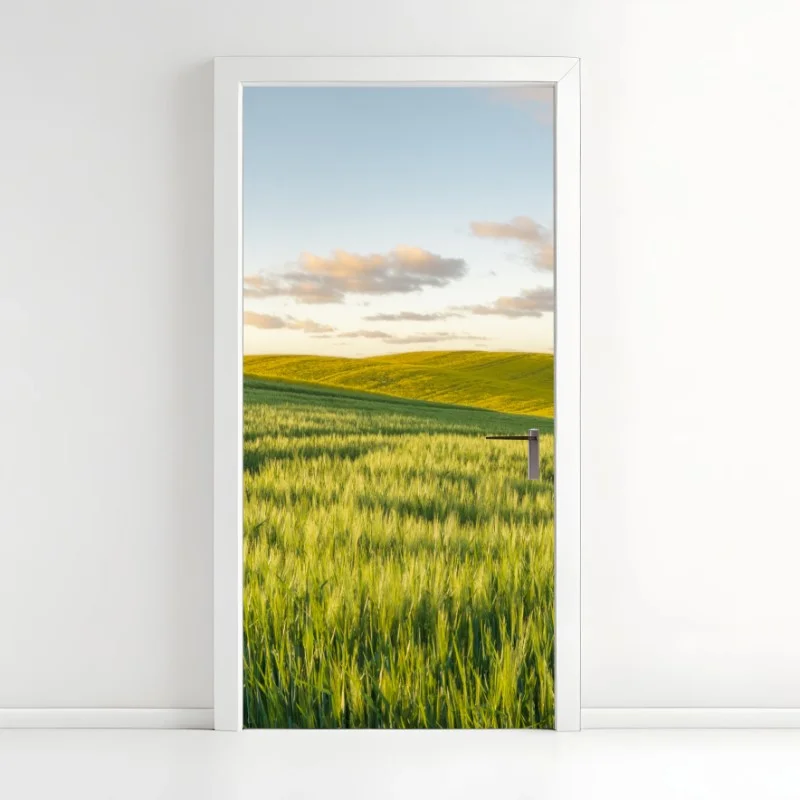 Pegatina para puerta panorama de campo primaveral en colinas verdes