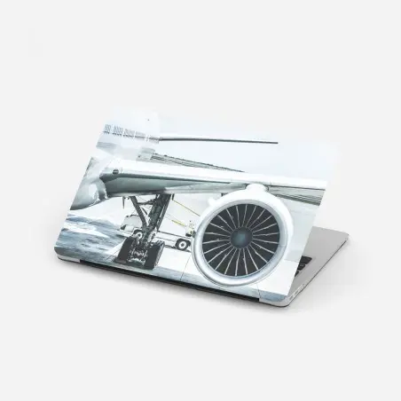 Pegatina para portátil motor de avión en la terminal: esencia de viaje – Pixers®