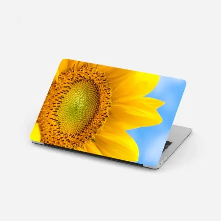 Pegatina para portátil girasol brillante contra cielo azul – Pixers®