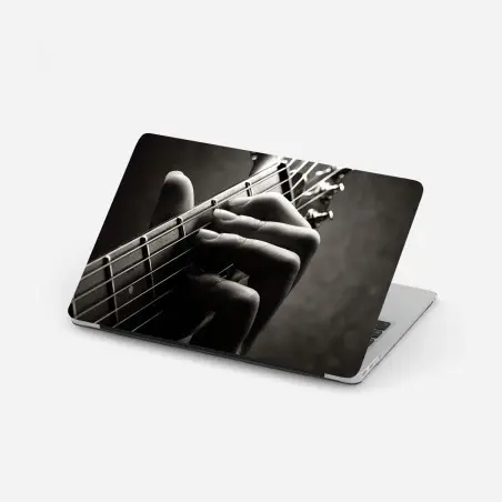 Pegatina para portátil melodía en las cuerdas: detalle de mano guitarrista – Pixers®