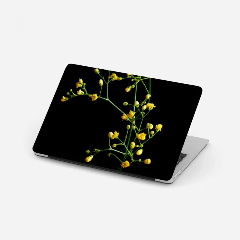 Pegatina para portátil paniculata amarilla sobre fondo negro