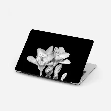 Pegatina para portátil freesia en monocromo sobre fondo negro – Pixers®