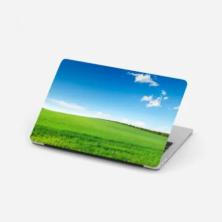 Pegatina para portátil paisaje sereno de pradera verde y cielo azul – Pixers®