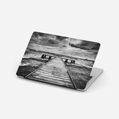 Pegatina para portátil muelle solitario sobre mar tempestuoso – Pixers®