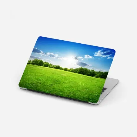 Pegatina para portátil amanecer sobre pradera verde y cielo azul – Pixers®