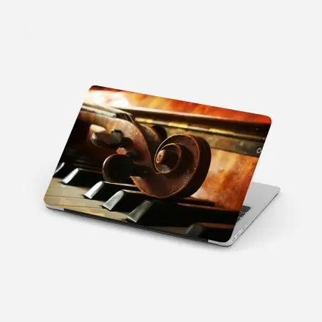 Pegatina para portátil contrastes musicales: detalle de violín sobre piano – Pixers®