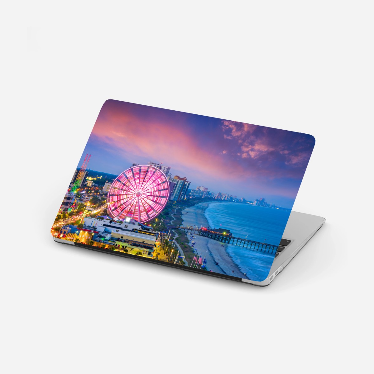 Pegatina para portátil puesta de sol en Myrtle Beach con noria iluminada – Pixers®