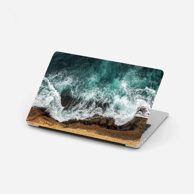 Pegatina para portátil olas sobre acantilado en tonos turquesa