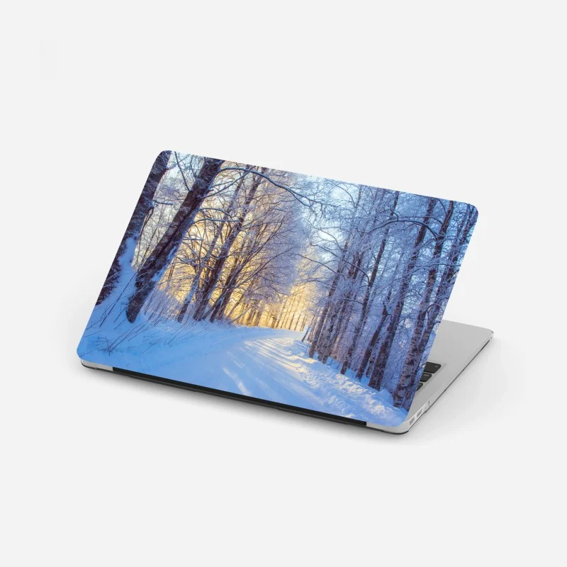 Pegatina para portátil camino nevado al amanecer en el bosque