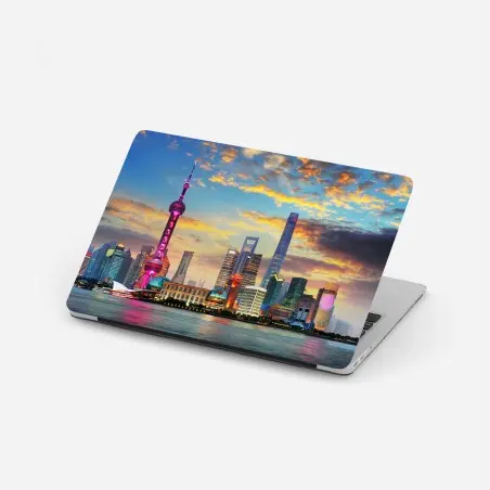 Pegatina para portátil atardecer vibrante sobre el horizonte de Shanghai – Pixers®
