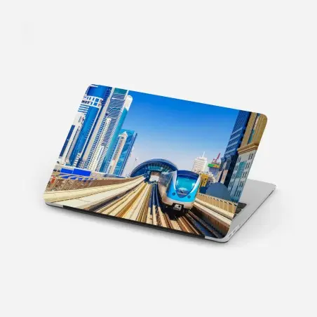 Pegatina para portátil tren metropolitano entre rascacielos – Pixers®