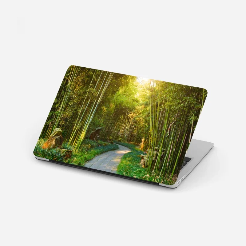 Pegatina para portátil sendero sereno entre bambús al amanecer