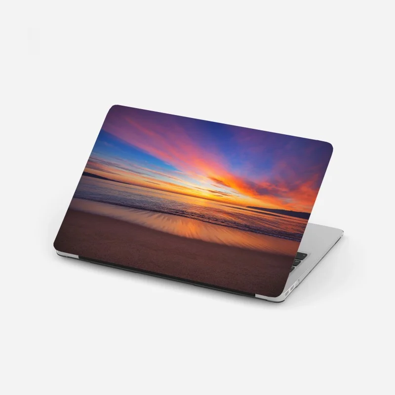 Pegatina para portátil amanecer sobre el mar colores del horizonte