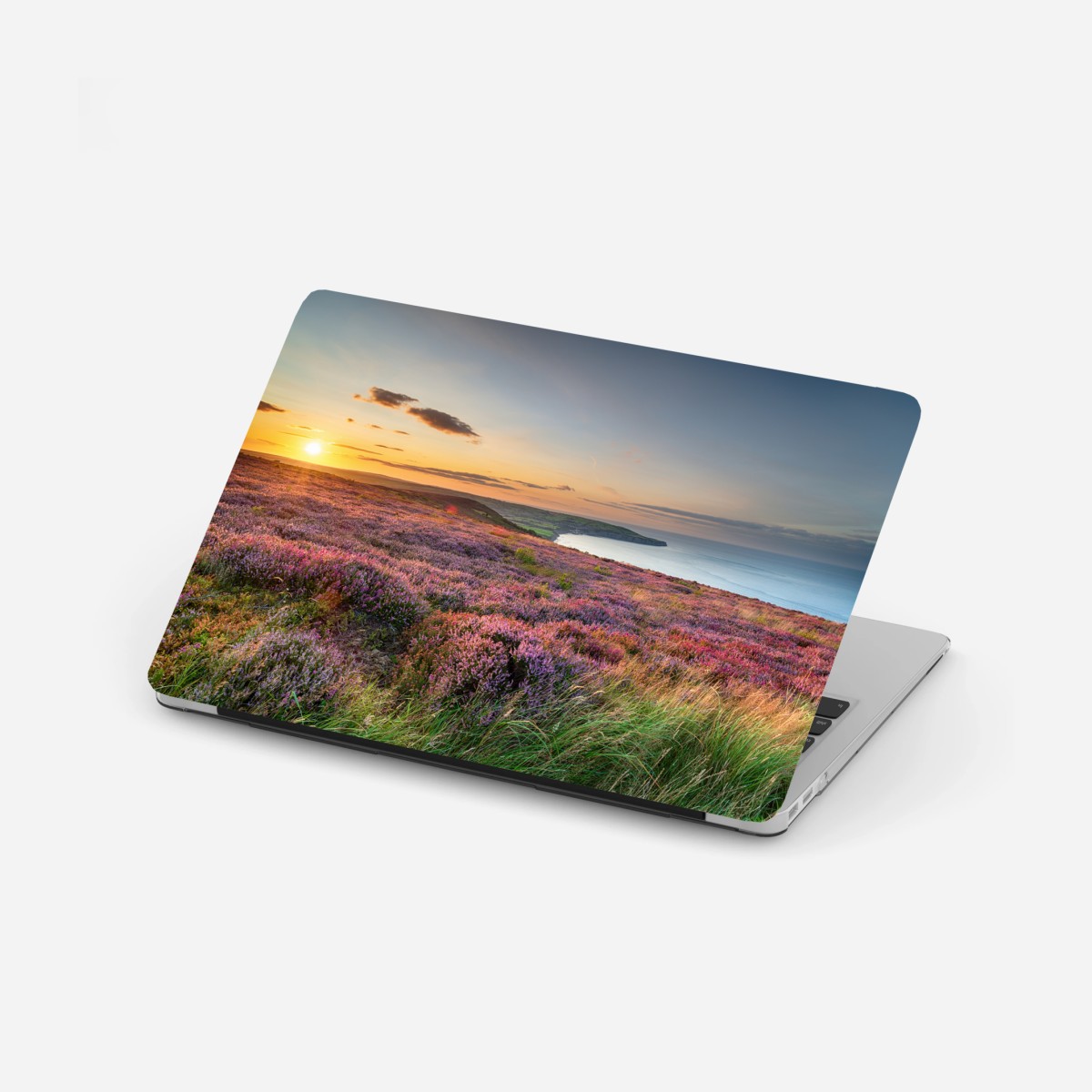 Pegatina para portátil atardecer sobre brezos en North York Moors – Pixers®