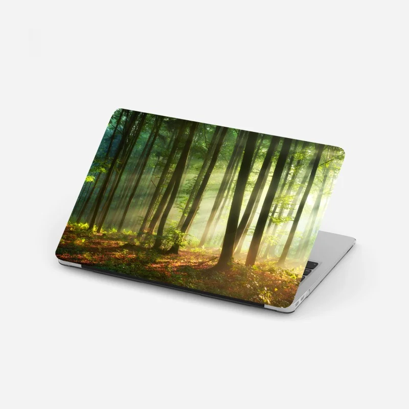 Pegatina para portátil bosque al amanecer con luz dorada