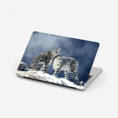 Pegatina para portátil pareja de leopardos de las nieves en paisaje invernal – Pixers®